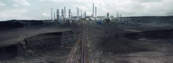 Movie still from “Woodkid - Goliath” (2020), directed by Yoann Lemoine – Extreme Wide shot, Overhead angle