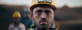 Movie still from “Woodkid - Goliath” (2020), directed by Yoann Lemoine – Close Up shot, Low angle