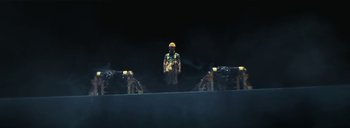 Movie still from “Woodkid - Goliath” (2020), directed by Yoann Lemoine – Wide shot, Overhead angle