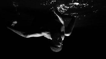 Movie still from “Neumodel feat. Kiddy Smile - Hayah” (2020), directed by Axel Morin – Medium shot, Overhead angle