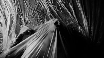 Movie still from “Neumodel feat. Kiddy Smile - Hayah” (2020), directed by Axel Morin – Extreme Close Up shot, Low angle
