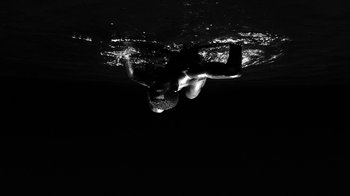 Movie still from “Neumodel feat. Kiddy Smile - Hayah” (2020), directed by Axel Morin – Medium shot, Overhead angle