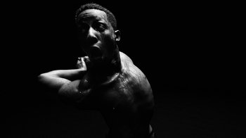 Movie still from “Neumodel feat. Kiddy Smile - Hayah” (2020), directed by Axel Morin – Medium shot, Low angle