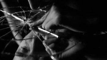 Movie still from “Neumodel feat. Kiddy Smile - Hayah” (2020), directed by Axel Morin – Extreme Close Up shot, Low angle