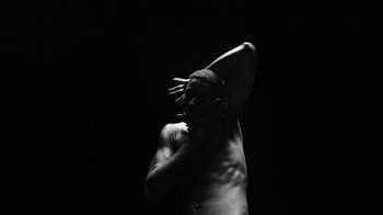 Movie still from “Neumodel feat. Kiddy Smile - Hayah” (2020), directed by Axel Morin – Medium shot, Low angle