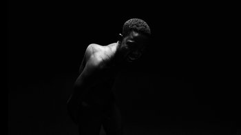 Movie still from “Neumodel feat. Kiddy Smile - Hayah” (2020), directed by Axel Morin – Medium shot, Low angle