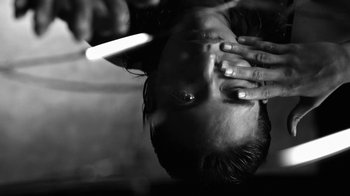 Movie still from “Neumodel feat. Kiddy Smile - Hayah” (2020), directed by Axel Morin – Extreme Close Up shot, Low angle