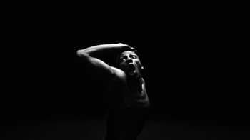 Movie still from “Neumodel feat. Kiddy Smile - Hayah” (2020), directed by Axel Morin – Medium shot, Low angle