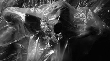 Movie still from “Neumodel feat. Kiddy Smile - Hayah” (2020), directed by Axel Morin – Extreme Close Up shot, Overhead angle
