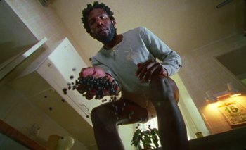 Movie still from “Dune & Crayon feat. Ichon - Pointless” (2020), directed by Alice Kong – Medium shot, Low angle