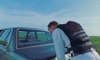 Movie still from “Dune & Crayon feat. Ichon - Pointless” (2020), directed by Alice Kong – Medium shot, Low angle