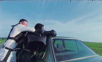 Movie still from “Dune & Crayon feat. Ichon - Pointless” (2020), directed by Alice Kong – Medium shot, Low angle