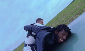 Movie still from “Dune & Crayon feat. Ichon - Pointless” (2020), directed by Alice Kong – Medium shot, Low angle