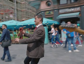 Movie still from “Attawalpa - Take A Bite” (2020), directed by Lucy Luscombe – Wide shot, Over the shoulder angle