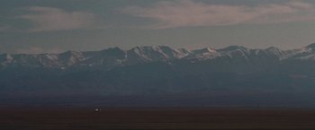 Movie still from “EDEN - Love Death Distraction” (2019), directed by Zhang – Extreme Wide shot, Low angle