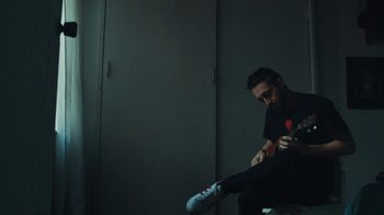 Movie still from “Depeche Mode (Trailer) - Spirits in the Forest” (2019), directed by Pasqual Gutierrez – Wide shot, Low angle