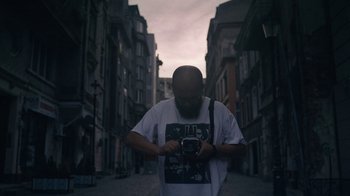 Movie still from “Depeche Mode (Trailer) - Spirits in the Forest” (2019), directed by Pasqual Gutierrez – Medium shot, Low angle