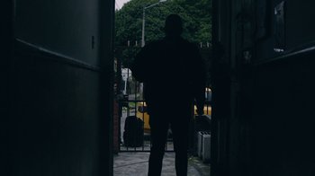 Movie still from “Depeche Mode (Trailer) - Spirits in the Forest” (2019), directed by Pasqual Gutierrez – Wide shot, Low angle