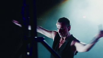 Movie still from “Depeche Mode (Trailer) - Spirits in the Forest” (2019), directed by Pasqual Gutierrez – Medium shot, Low angle