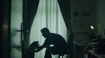 Movie still from “Depeche Mode (Trailer) - Spirits in the Forest” (2019), directed by Pasqual Gutierrez – Medium shot, Low angle