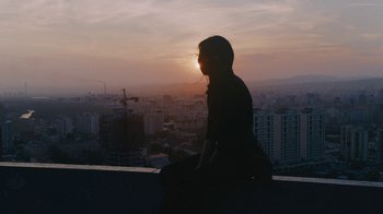 Movie still from “Depeche Mode (Trailer) - Spirits in the Forest” (2019), directed by Pasqual Gutierrez – Medium shot, Low angle