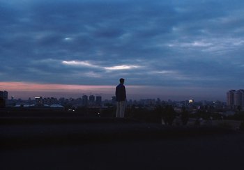 Movie still from “Låpsley - My Love Was Like The Rain” (2019), directed by Camille Summers-Valli – Extreme Wide shot, Low angle
