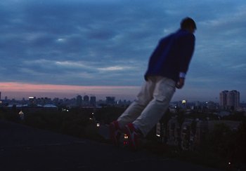 Movie still from “Låpsley - My Love Was Like The Rain” (2019), directed by Camille Summers-Valli – Wide shot, Low angle