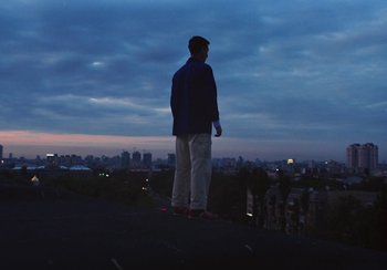 Movie still from “Låpsley - My Love Was Like The Rain” (2019), directed by Camille Summers-Valli – Wide shot, Low angle