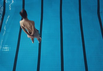 Movie still from “Låpsley - My Love Was Like The Rain” (2019), directed by Camille Summers-Valli – Wide shot, Overhead angle