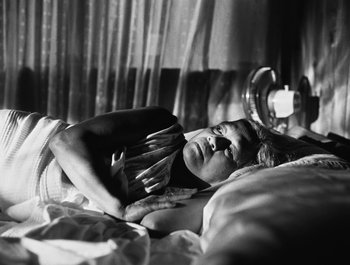 Movie still from “Alaskan Tapes - And, We Disappear” (2019), directed by Meredith Hama-Brown – Medium shot, Low angle