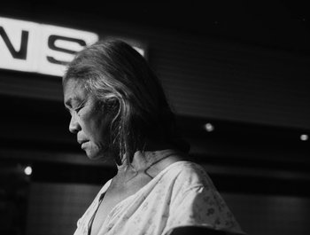 Movie still from “Alaskan Tapes - And, We Disappear” (2019), directed by Meredith Hama-Brown – Close Up shot, Low angle