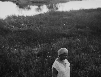 Movie still from “Alaskan Tapes - And, We Disappear” (2019), directed by Meredith Hama-Brown – Wide shot, High angle