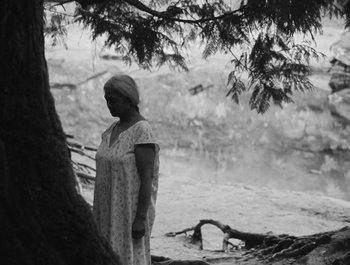 Movie still from “Alaskan Tapes - And, We Disappear” (2019), directed by Meredith Hama-Brown – Medium shot, High angle