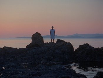 Movie still from “Alaskan Tapes - And, We Disappear” (2019), directed by Meredith Hama-Brown – Extreme Wide shot, Low angle