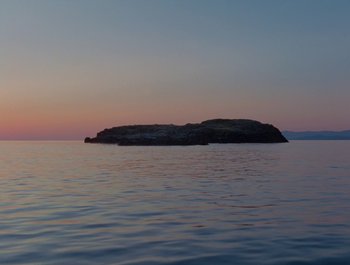 Movie still from “Alaskan Tapes - And, We Disappear” (2019), directed by Meredith Hama-Brown – Extreme Wide shot, High angle