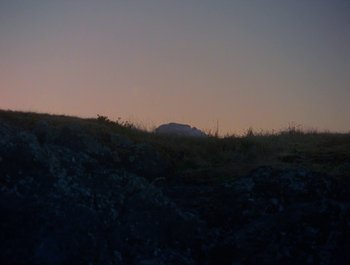 Movie still from “Alaskan Tapes - And, We Disappear” (2019), directed by Meredith Hama-Brown – Extreme Wide shot, Low angle