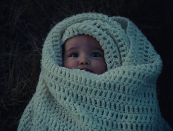 Movie still from “Alaskan Tapes - And, We Disappear” (2019), directed by Meredith Hama-Brown – Close Up shot, High angle