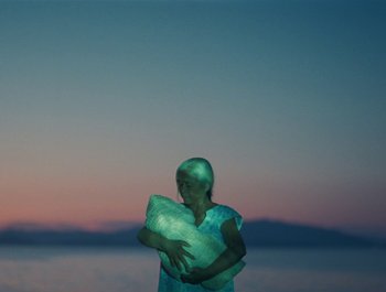 Movie still from “Alaskan Tapes - And, We Disappear” (2019), directed by Meredith Hama-Brown – Wide shot, Low angle