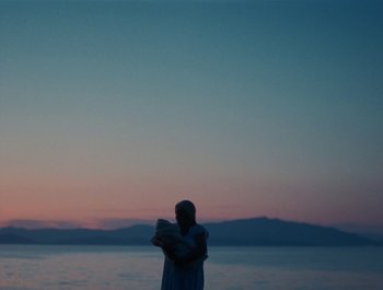 Movie still from “Alaskan Tapes - And, We Disappear” (2019), directed by Meredith Hama-Brown – Extreme Wide shot, Low angle