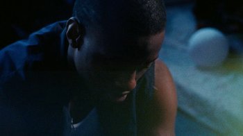 Movie still from “Jurdan Bryant - Words for Thomas” (2019), directed by Alonzo Hellerbach – Extreme Close Up shot, High angle