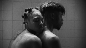 Movie still from “Jurdan Bryant - Words for Thomas” (2019), directed by Alonzo Hellerbach – Close Up shot, Overhead angle
