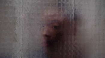 Movie still from “Jurdan Bryant - Words for Thomas” (2019), directed by Alonzo Hellerbach – Extreme Close Up shot, Overhead angle