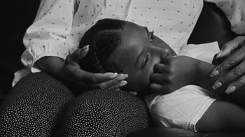 Movie still from “Jurdan Bryant - Words for Thomas” (2019), directed by Alonzo Hellerbach – Extreme Close Up shot, High angle