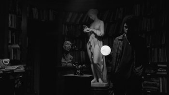Movie still from “Jurdan Bryant - Words for Thomas” (2019), directed by Alonzo Hellerbach – Medium shot, Low angle