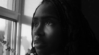 Movie still from “Jurdan Bryant - Words for Thomas” (2019), directed by Alonzo Hellerbach – Extreme Close Up shot, High angle