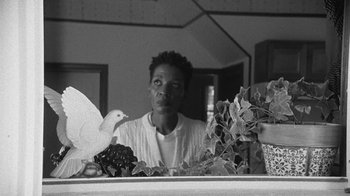 Movie still from “Jurdan Bryant - Words for Thomas” (2019), directed by Alonzo Hellerbach – Medium shot, Low angle