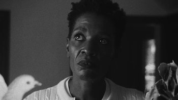 Movie still from “Jurdan Bryant - Words for Thomas” (2019), directed by Alonzo Hellerbach – Close Up shot, Low angle
