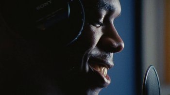 Movie still from “Jurdan Bryant - Words for Thomas” (2019), directed by Alonzo Hellerbach – Extreme Close Up shot, Low angle
