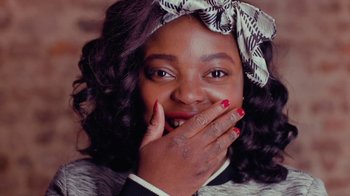 Movie still from “Rain Phoenix - Immolate” (2019), directed by Gus Van Sant – Close Up shot, Over the shoulder angle