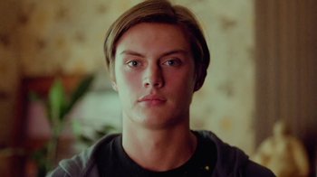 Movie still from “Rain Phoenix - Immolate” (2019), directed by Gus Van Sant – Close Up shot, Low angle